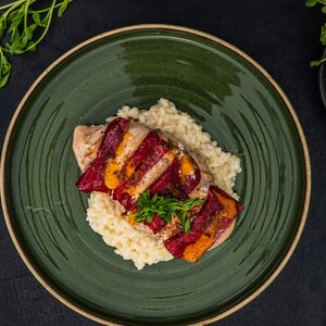 Hähnchenbrustfächer auf Risotto
