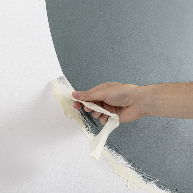 Magnetische Wanddeko: Klebeband abziehen