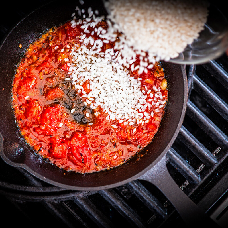 Paella Reis hinzufügen